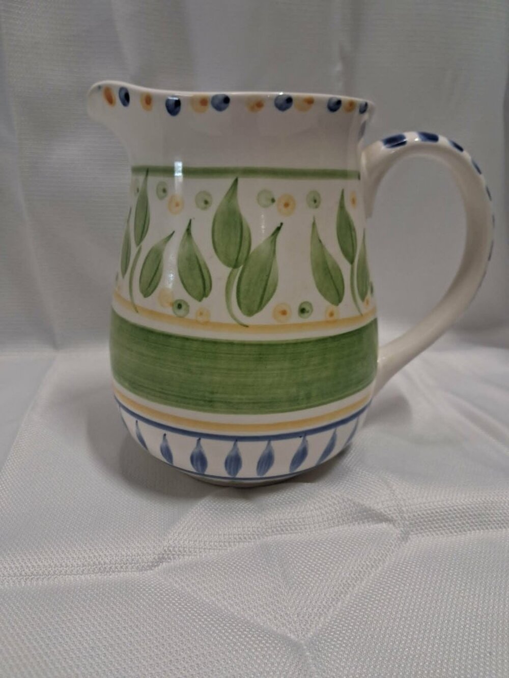 Gibson 8-inch Ceramic Pitcher White Leaf Pattern Green Yellow Blue